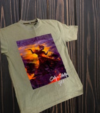 a t - shirt with an image of a woman riding a horse