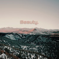 an image of a mountain with the word beauty written on it
