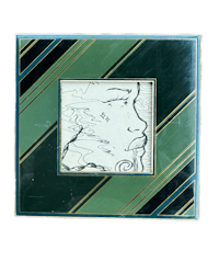 a green and black frame with an image of a woman