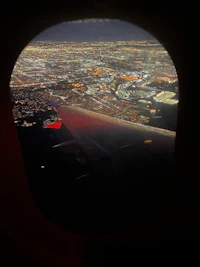 a view of a city from an airplane window