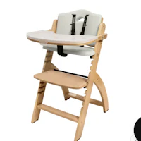 a wooden high chair with a black and white seat