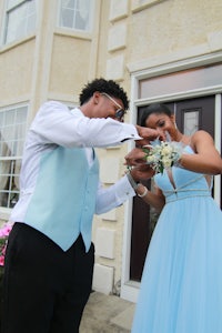 a woman wearing a blue dress