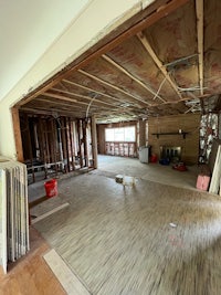a room that is being remodeled with wood flooring