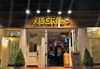 a restaurant with a sign that says negril