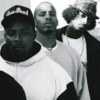 a black and white photo of a group of men