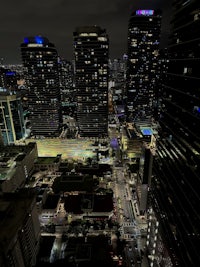 an aerial view of a city at night