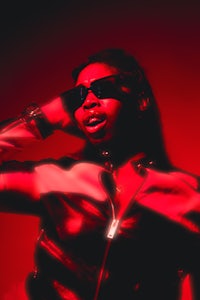a woman in a black leather jacket