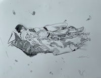 a drawing of a woman laying on a pillow