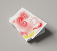 a stack of books on a grey background