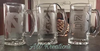 three glass beer mugs with the word north carolina on them