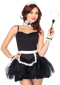 a woman in a maid costume holding a broom