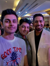 a group of people posing for a photo at an event