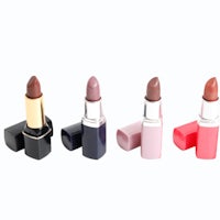 four lipsticks in different colors on a white background