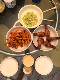 a glass table with a lot of food on it