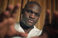 a man with his hands out in front of him
