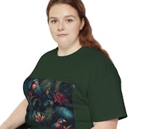 a woman wearing a plus size t - shirt with a tropical print