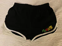 a pair of black shorts with chinese writing on them