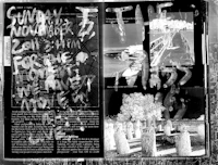 a black and white photo of a magazine with graffiti on it