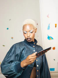 a woman holding a cell phone