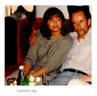 a man and a woman sitting on a couch