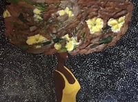 a painting of a woman with flowers on her head