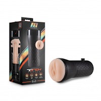 a black and white sex toy in a box