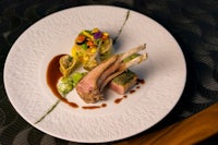 a white plate with a dish on it