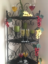 a wine rack with a bunch of grapes on it