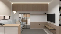 a small living room with a couch and tv