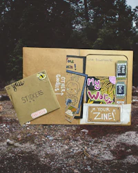 a brown envelope with a picture of a tree on it