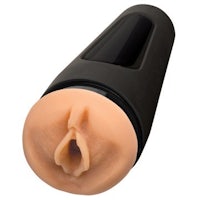 a black sex toy with an open mouth
