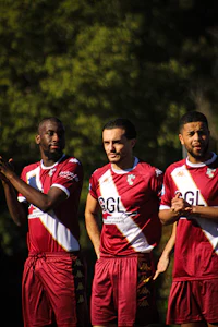 a group of soccer players posing for a picture