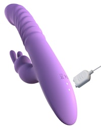 a purple sex toy with a cord attached to it
