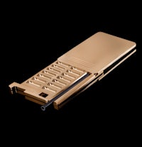 a gold cell phone with a black cover