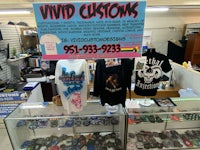 a display of t - shirts and other items in a store