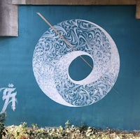 a blue wall with chinese writing on it