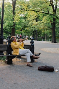 a man sitting on a bench
