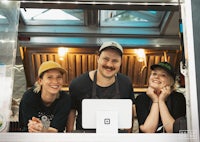 a group of people in a food truck