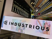 an escalator with a sign that says industrials
