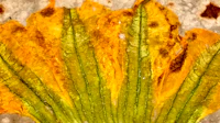 a close up of a dried yellow flower