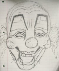 a drawing of a clown with a smile on his face