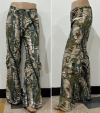 a pair of camouflage pants on a mannequin