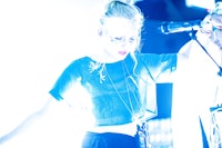 a woman holding a microphone