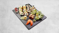 japanese sushi platter on a black slate