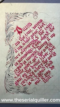 a piece of paper with a red calligraphy on it