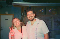 a man and a woman posing for a picture