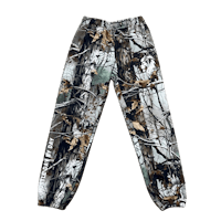 a pair of camouflage joggers on a black background