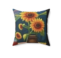 a pillow with sunflowers in a vase