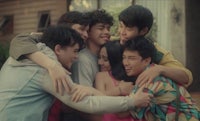 a group of young people hugging each other