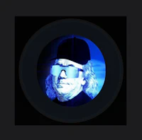 a blue circle with an image of a man wearing sunglasses
